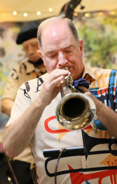 Bill Ash playing a flugelhorn